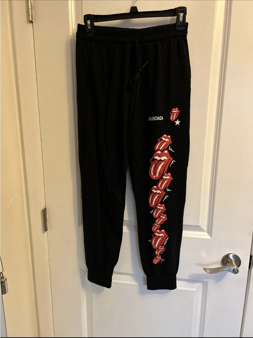 Balenciaga Black Joggers with Red Tongue Graphic